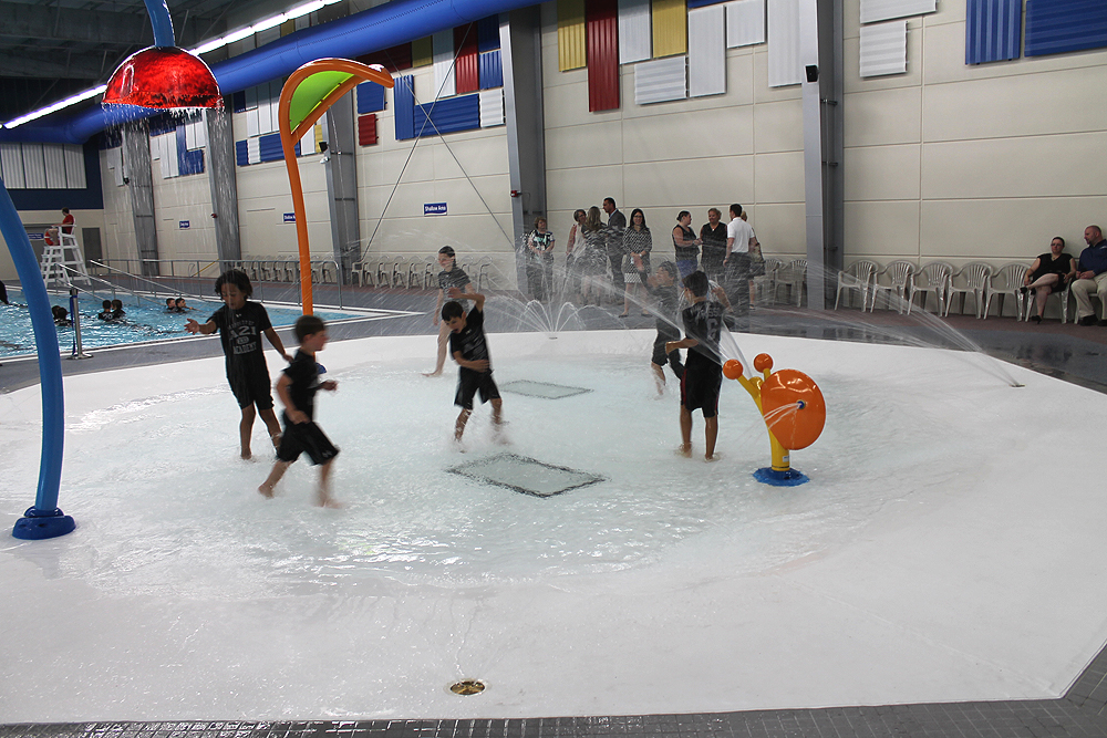 Academy 21 kids enjoying the splash pad