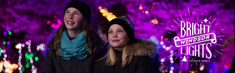 Two young sisters in awe of the illumination