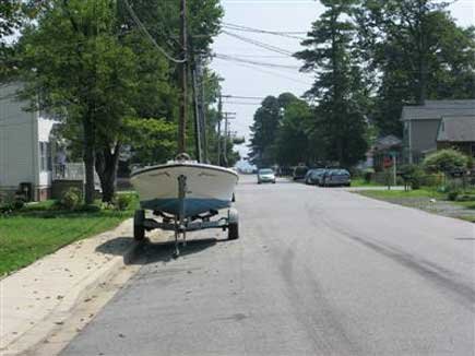 Unattached trailer on street