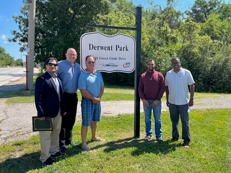 Mayor Dilkens and guests at the Derwent Park sign