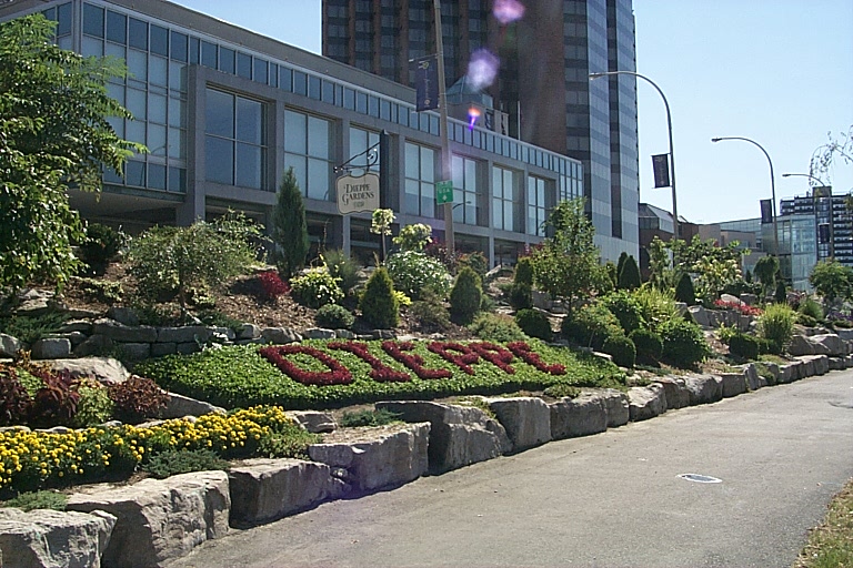 Dieppe written in decorative greenery along a path at Dieppe Gardens Park