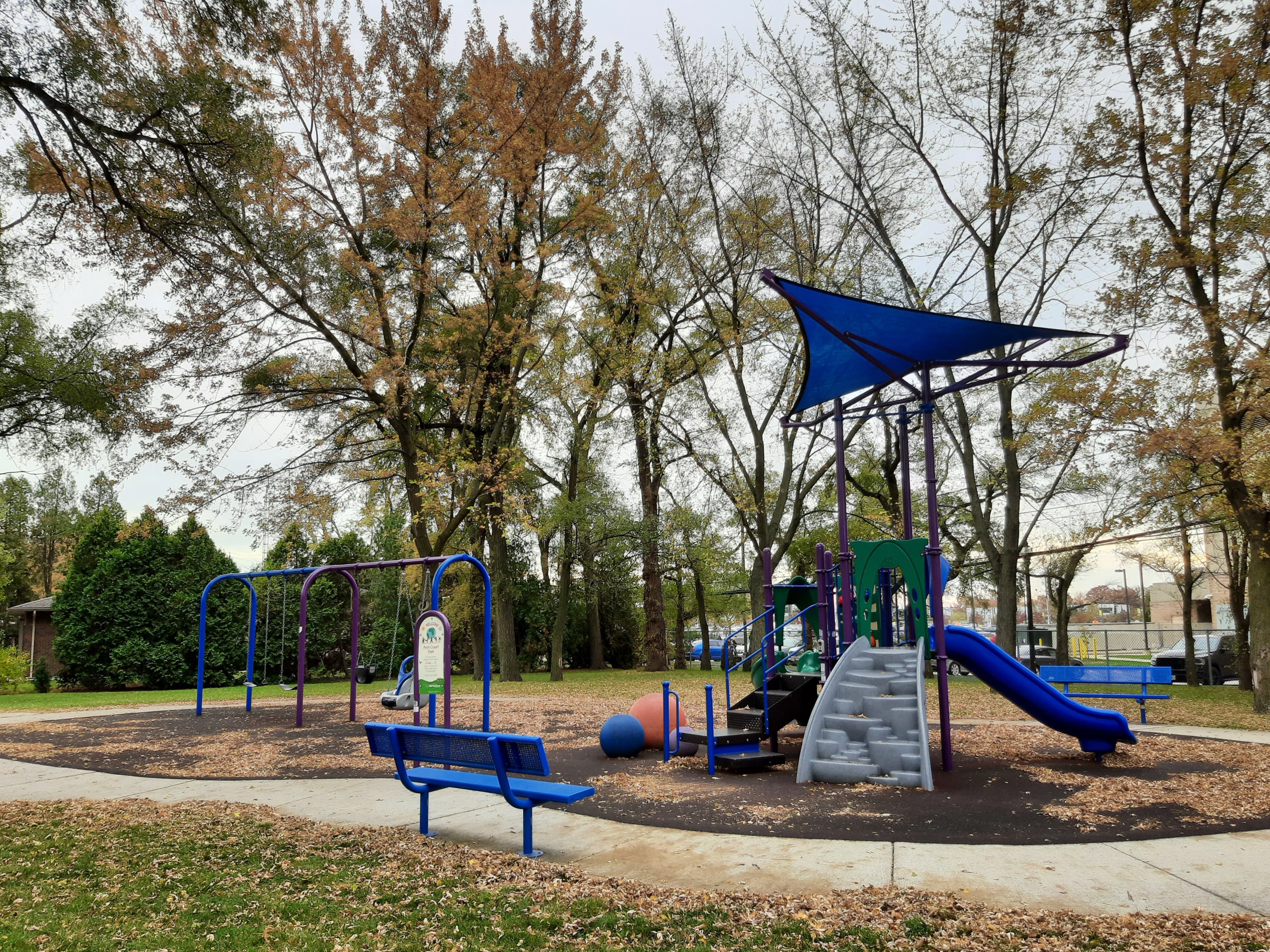 Playground and benches in autumn