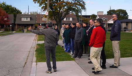 Group of residents on a Community Safety and Crime Prevention Walk as part of the October 28 to 29, 2025, Crime Prevention through Environmental Design Training Course