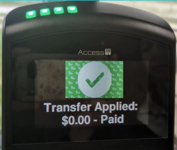 Umo green checkmark on a screen with indication that fare is paid